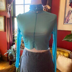 Transparent blue turtleneck crop top